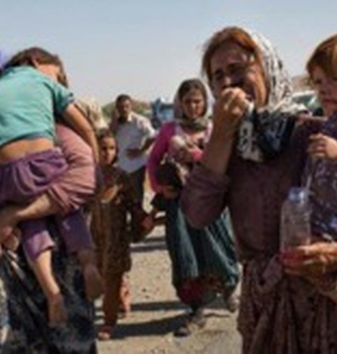 Donne e bambini yazidi in fuga dall'Isis. 
